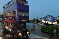 Knight Bus from Harry Potter movies in front of Globe with IOA Lighthouse in background Harry Potter Publicity